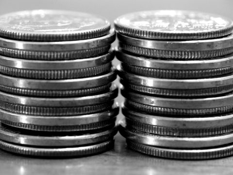 Two stacks of coins side by side