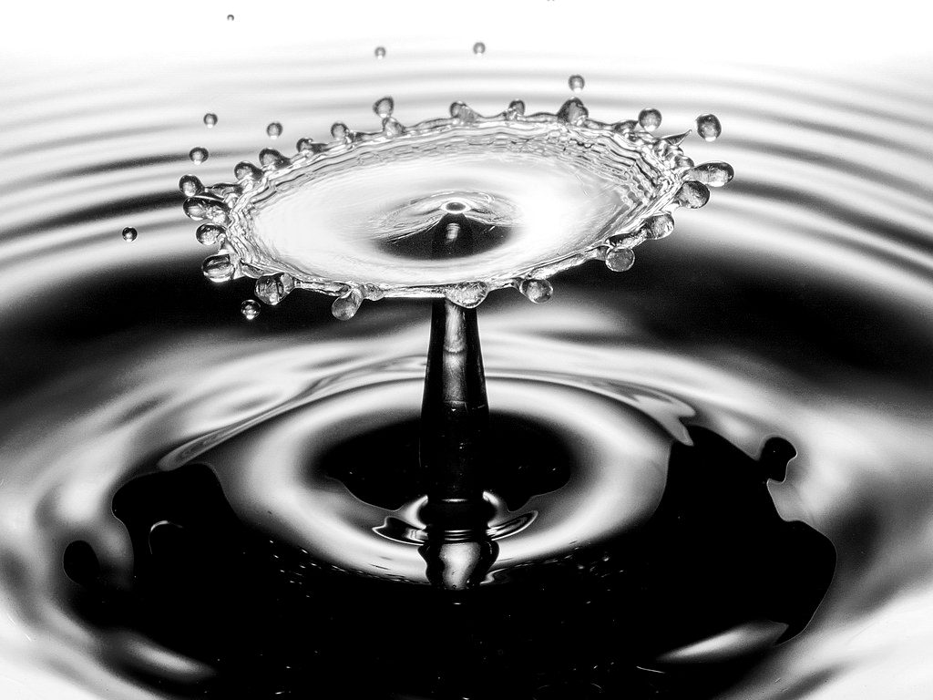 A droplet rebounding from blue water