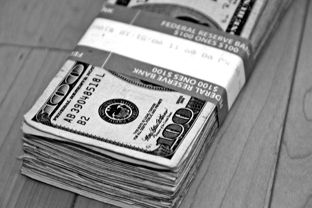 A strapped bundle of hundred-dollar bills