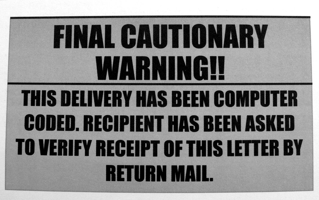 A 'final cautionary warning' notice from a postal scam